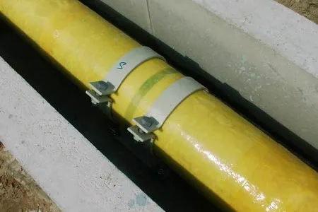 Pipe section finished with a cured FiberTec laminate